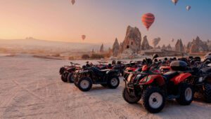 Cappadocia sunset ATV tour riding through valleys during golden hour
